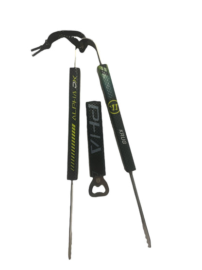 Torey Krug Game Used Stick; Tongs+Bottle Opener